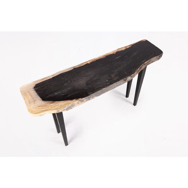 Made of one slab of petrified wood with beautiful natural flowing grain. The top of the slab is polished to show its...
