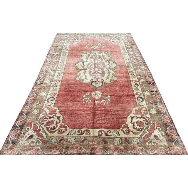 Exact Size: 6'7" x 11'0" Color: Red Age: Old Materials: Wool Construction: Hand Knotted Origin: Turkey