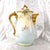 This is a cream and blue chocolate pot by Lewis Straus and Sons of Limoges. The backstamp is dated from 1890 to 1920. The...