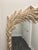 Bring timeless Palm Beach elegance to your home with this striking vintage Serge Roche-style mirror, featuring an...