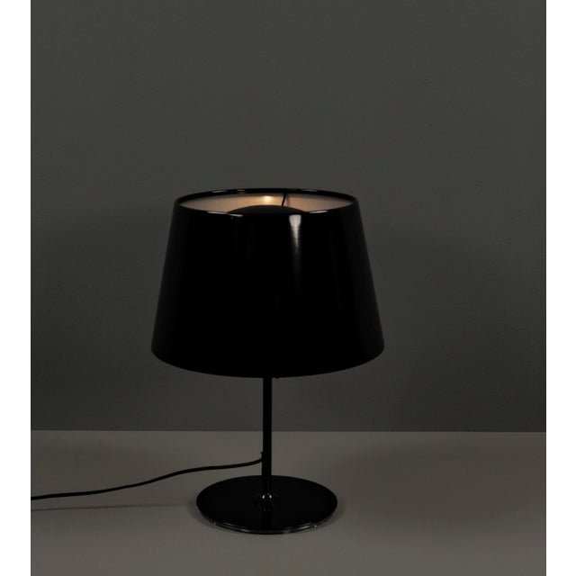 This table lamp from the 2000s, designed by c halskov & dalsgaard for ikea, impresses with its clean, modern lines and...