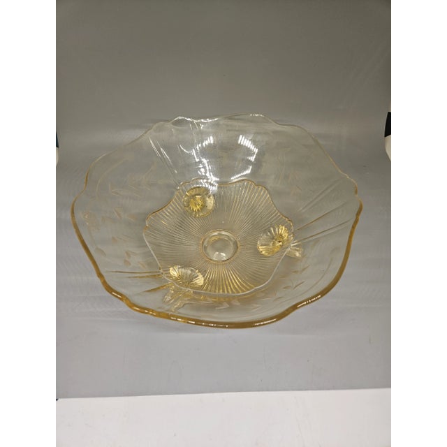 Yellow Depression Glass with a three footed Bowl With Etched Pattern,