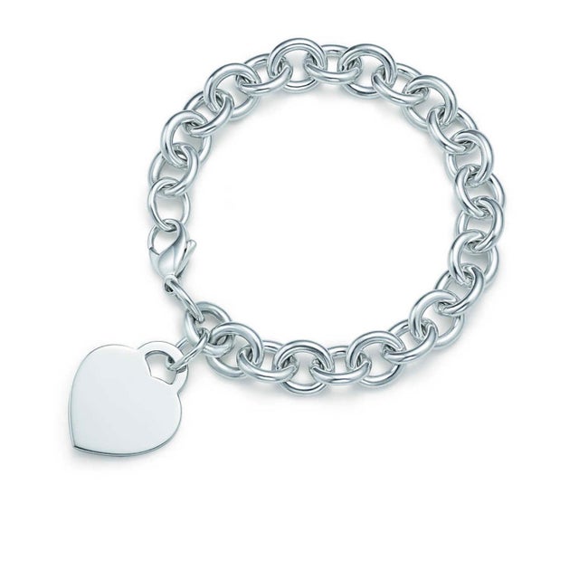 Tiffany &amp; Co. Sterling Silver Heart Tag Charm Bracelet Tiffany &amp; Co. In Box An elite authentic bracelet from...