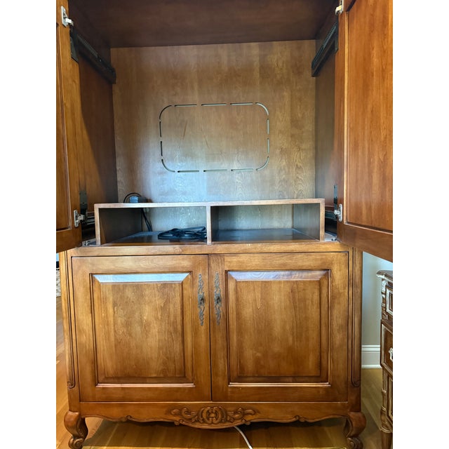 This Fremarc French Country Armoire is stunning! It's a classic piece that would complement many styles.