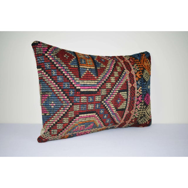 This handwoven kilim pillow is made from Anatolia and Middleast Kilim fragments. Each of our kilim pillow cover is cut...