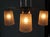 This Art Deco chandelier from Hettier Vincent consists of four partially etched glass tulips with Art Deco motifs and a...