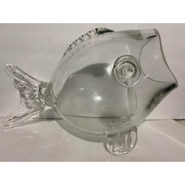Beautifully designed hand blown glass fish bowl with a ground and polished mouth edge. It has the Blenko signature style...