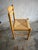 A beautiful set of four italian vintage dining chairs crafted in solid wood with a warm honey-toned finish. These chairs...