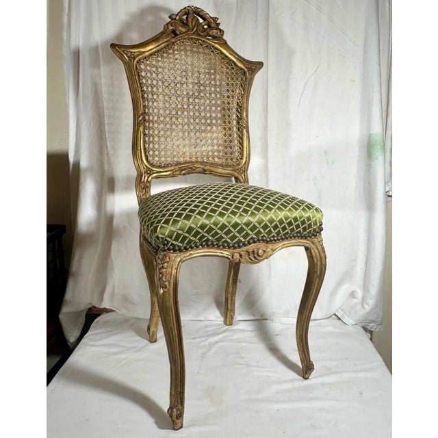 Rococo Style Giltwood Cane Chair with Upholstered Seat, Side Chair This petite chair raised on cabriole legs features a...