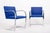 This pair of mid century modern Brno arm chairs by Mies van der Rohe were manufactured by Knoll in 2006. These iconic...