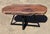 Nice hand made black walnut coffee or cocktail table with live edge and black metal base