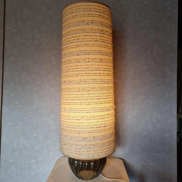 1970s desk lamp. Smoked glass base and cream cotton fabric shade. Height without shade: 16 cm European Plug (up to...