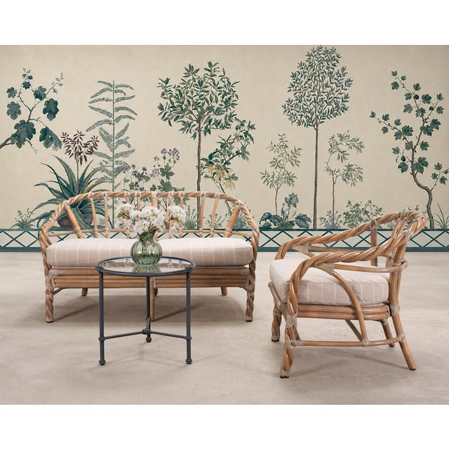 A rare pair of exceptional rattan seating hand-crafted by McGuire artisans in San Francisco, CA. The living room suite is...