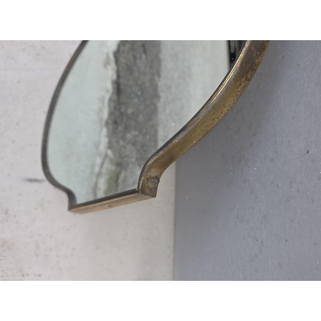 Small Italian Brass Shaped Mirror, 1950s, in Good conditions. Designed 1950 to 1959