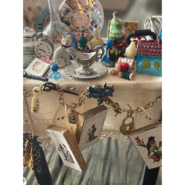 Unique miniature installation designed by miniaturist artist Ligia Young.
