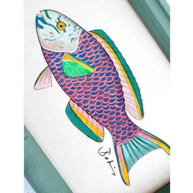 Meet Taffy— A bold, color-loving fish with the prettiest mix of pattern and personality. Hand-painted by master artists...
