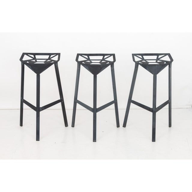 Set of Six Konstantin Grcic for Magis "Stool One" Aluminum Stackable Bar Stools, each on three supports conjoined by two...
