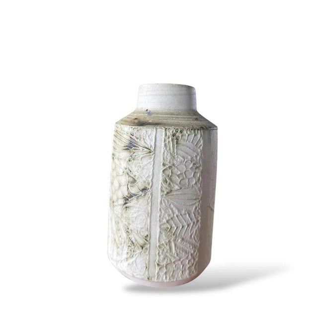The Vintage Carn Pottery Vase is a handcrafted ceramic vase designed to bring rustic pottery decor and coastal home decor...