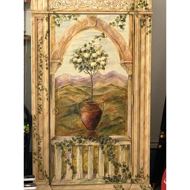 "Topiary" Media Center/ Wardrobe/ Armoire Right Side Facing : wrap around door . Interior: 3 adjustable shelves, back...