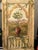 "Topiary" Media Center/ Wardrobe/ Armoire Right Side Facing : wrap around door . Interior: 3 adjustable shelves, back...