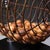 ABOUT A vintage, metal bingo cage with chrome supports, orange Bakelite handle, wooden balls and pewter ball basket...