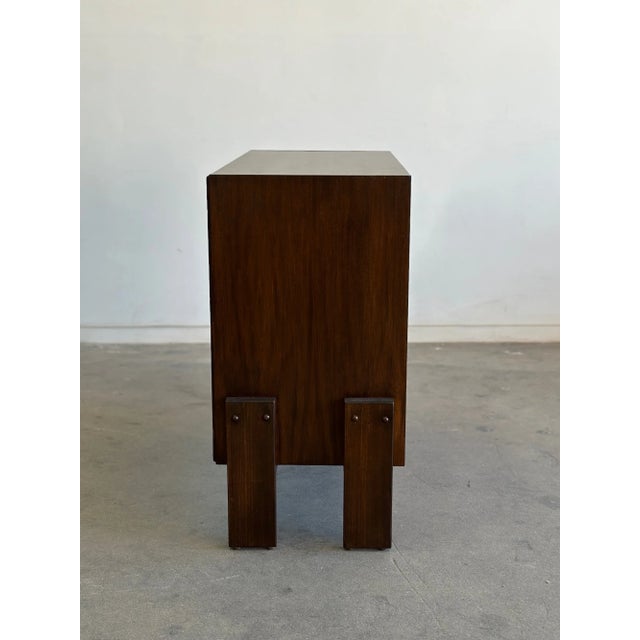 W34 D15.75 H31 Shelf space 10.75 Reworked mid century cabinet with new solid wood exterior legs refinished in a deep...