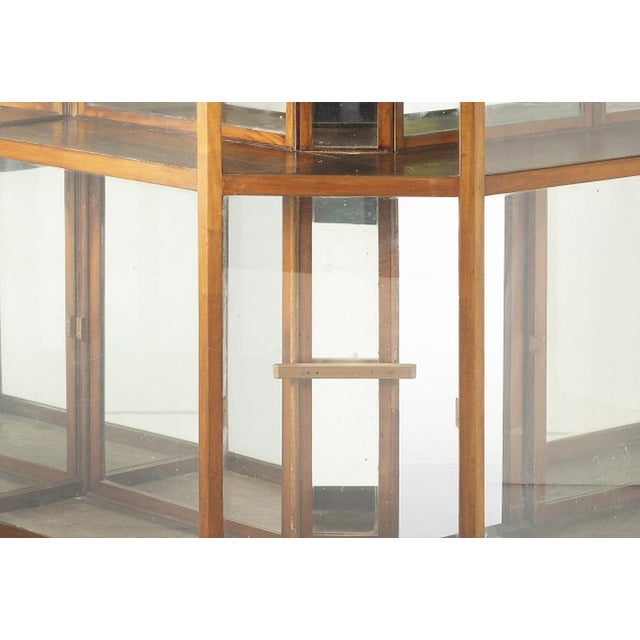 Display case - 19th century. Portuguese; 19th century, made of mahogany and chestnut wood; glass top; glazed fronts. Lower...