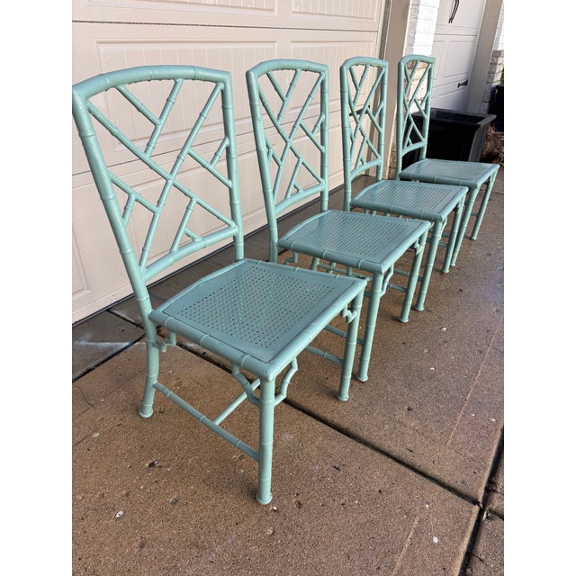 Offered is a 4 piece patio dining set by Meadowcraft. This set features a metal faux bamboo style frame. Can be purchased...