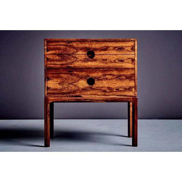 A Danish modern chest of drawers designed by Kai Kristiansen and produced by Aksel Kjersgaard in Odder, Denmark. Stamped...