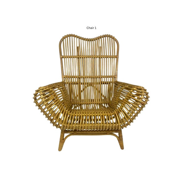 Bring natural warmth and sculptural beauty into your space with this pair of handmade Ibolili rattan lounge chairs....