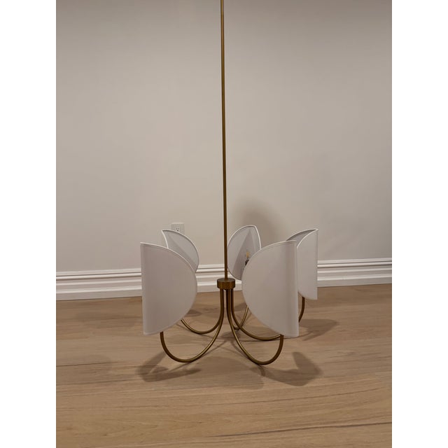 Elegant chandelier with white shades. Five light chandelier, less than one year old, perfect condition. Already removed...