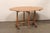 A French wine tasting table, with tilt-style top, from the early 20th century. This antique vintner's table from France...