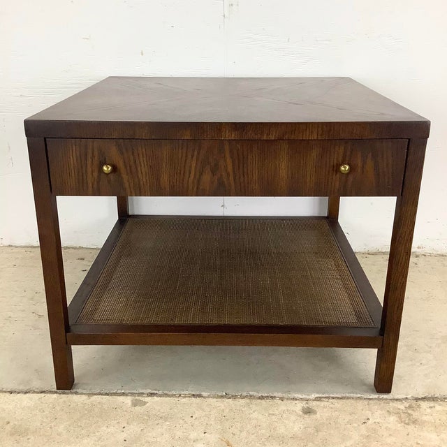 This vintage modern end table is a beautifully balanced example of functional 20th century design, where clean lines and...