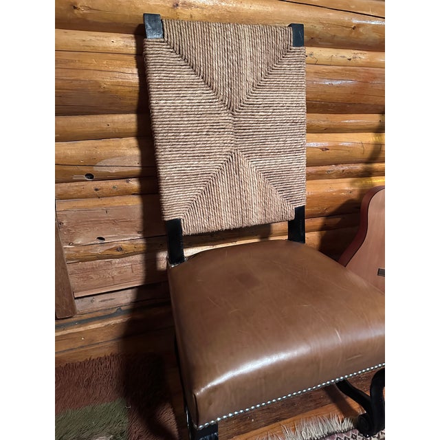 An authentic Ralph Lauren Home Blue Label dining side chair manufactured by EJ Victor, featuring a handwoven rush back,...