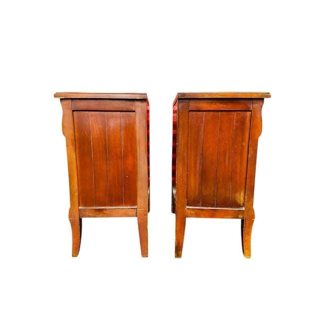 This is a pair of French Regency Louis XVI style mahogany and brass nightstands Available to purchase as a pair or as a...