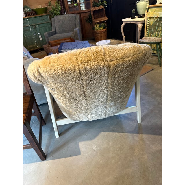 Sumptuous mid century style shearling chair made by Hancock&Moore. Natural camel color shering made in 2021 in North...