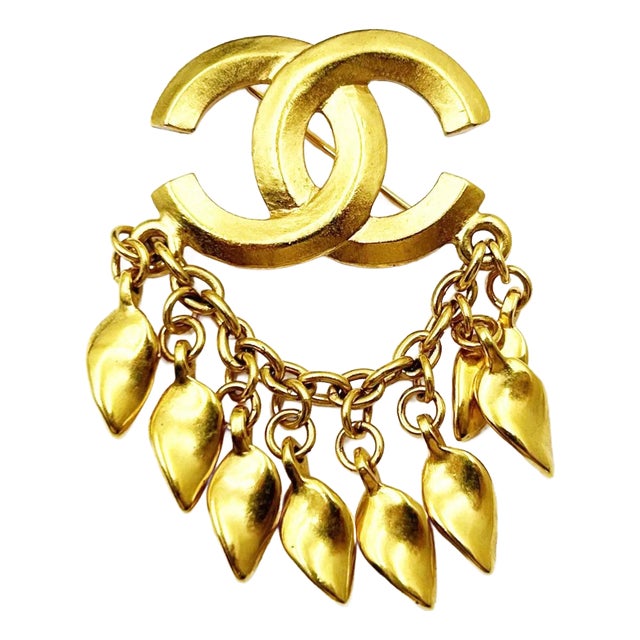 1990s Chanel Rare Vintage Gold Plated CC Dangling Leaves Brooch For Sale