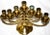This antique solid brass swing arm Menorah candelabra holds 7 candles. It belongs to a friend who is 70 years old. This...