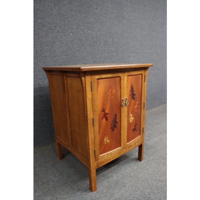Handcrafted Mission Arts & Crafts style media cabinet constructed of quarter-sawn oak and accented with striking Emile...