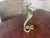 Here is an amazing weighty Mid Centuryi incised brass cobra candle holder. Has a lot of detail and makes a statement!...