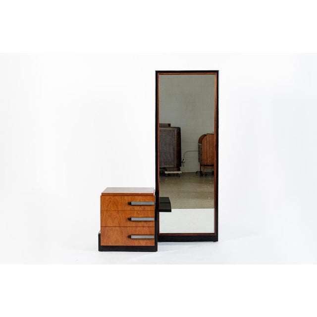 This beautiful vintage antique Art Deco maple wood vanity with full-length mirror and upholstered stool designed by Donald...