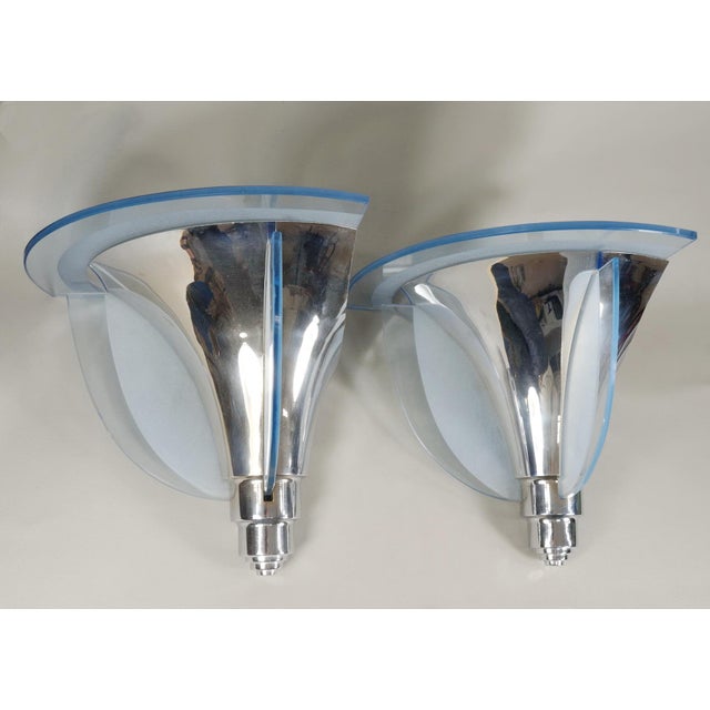 H. PETITOT A beautiful pair of 1933-1940 French art deco corner wall sconces in modernist style by Hubert Petitot. The...