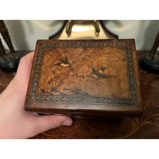 This is a truly unique antique box, not only does it have a faux book front. Fine inlay detail to the top - showcasing...