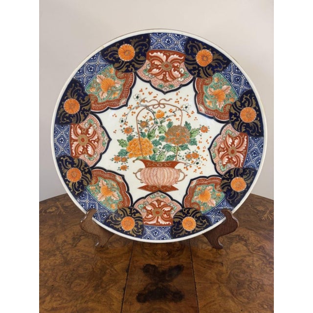 Unusual quality antique Japanese imari charger, having an unusual antique Japanese imari charger decorated with a basket...