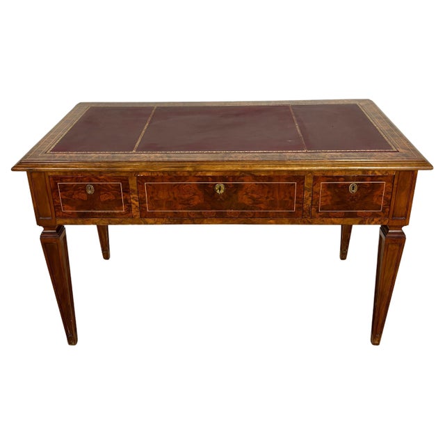 Elegant early 20th century walnut writing desk in the Louis XVI taste, featuring refined neoclassical lines and beautiful...