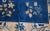 Handmade antique rug from Beijing, China, made in blue wool. The rug is in original condition, has some age wear. It is...