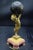 Small, mysterious 19th-century clock in patinated and gilded bronze on a marble base made by Ferdinand Gervais in Paris in...
