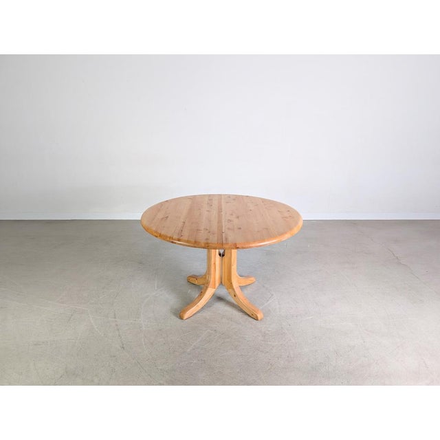 Beautiful extendable dining table by Rainer Daumiller from the 1970s-80s for sale. with its extension leaf, the table can...