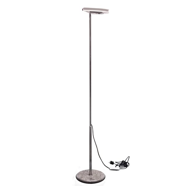 This floor lamp named Mezzaluna was designed by Bruno Gecchelin Italy 1974 and produced by Skipper Milan, Italy. This...