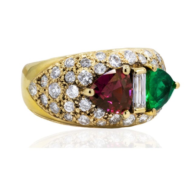 Complete your jewelry collection with our stunning Emerald & Ruby Ring. Featuring a classic ring design, this piece adds a...